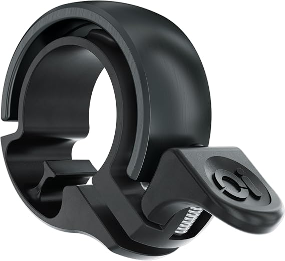 Knog Oi Bike Bicycle Bell - Original Luxury Styles, Built-in Cable Clip, Adult/Youth Bicycle Bell (Black, Copper, Brass, Aluminum)